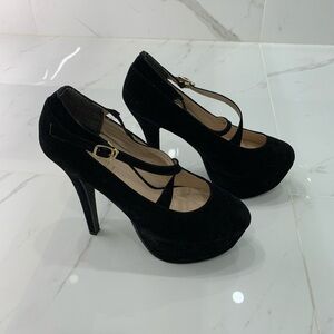 Black suede platform heels